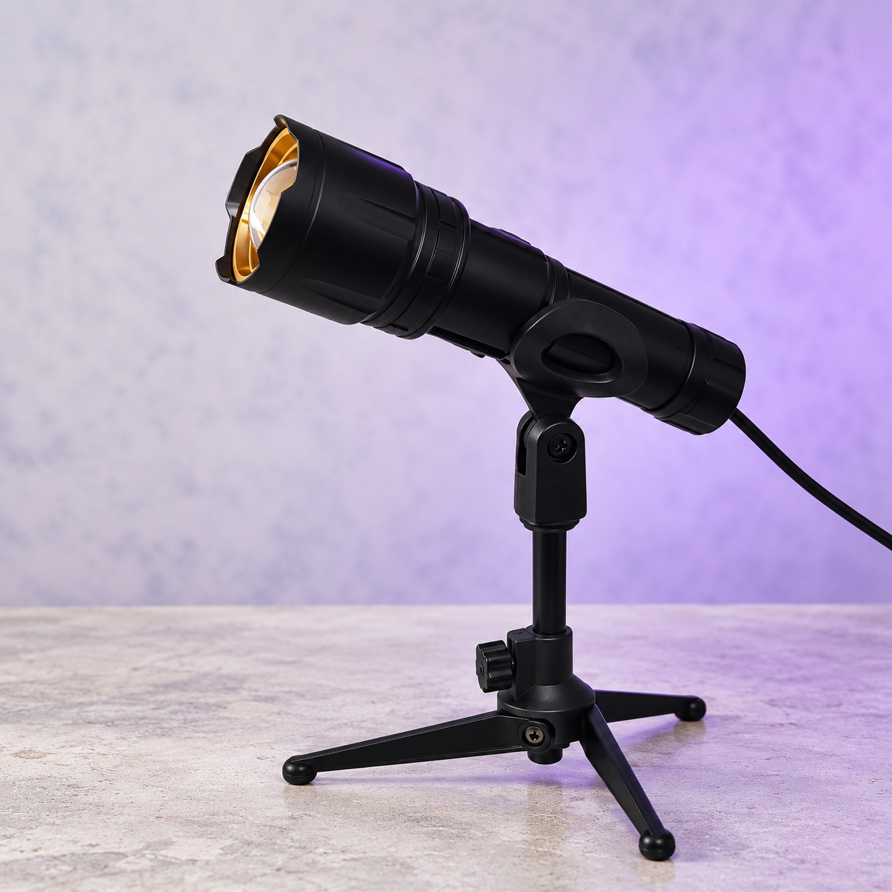Geometric Light Sequencer mounted on an adjustable tripod with a black spotlight and gold reflector.